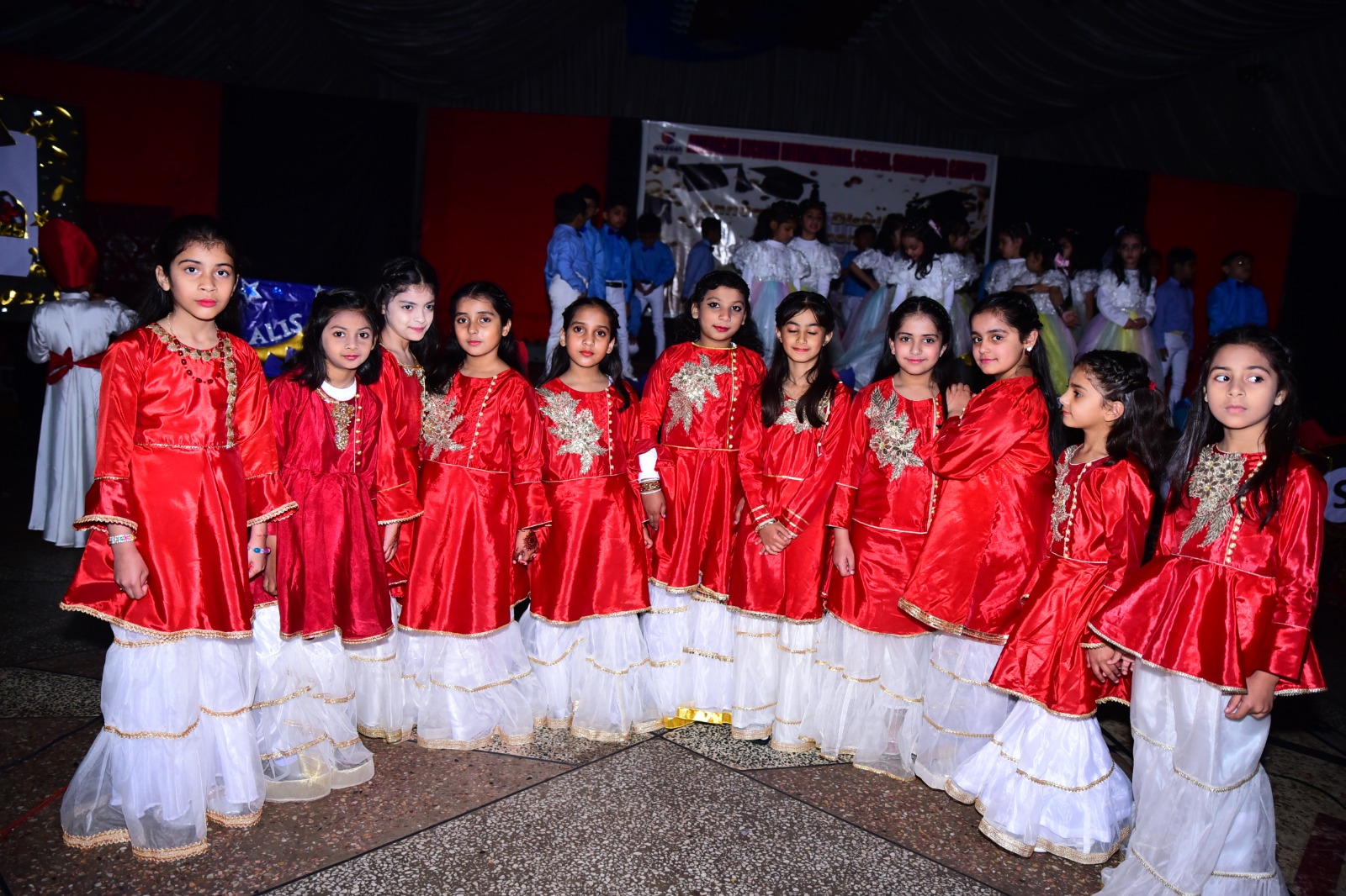 Students in red event dress